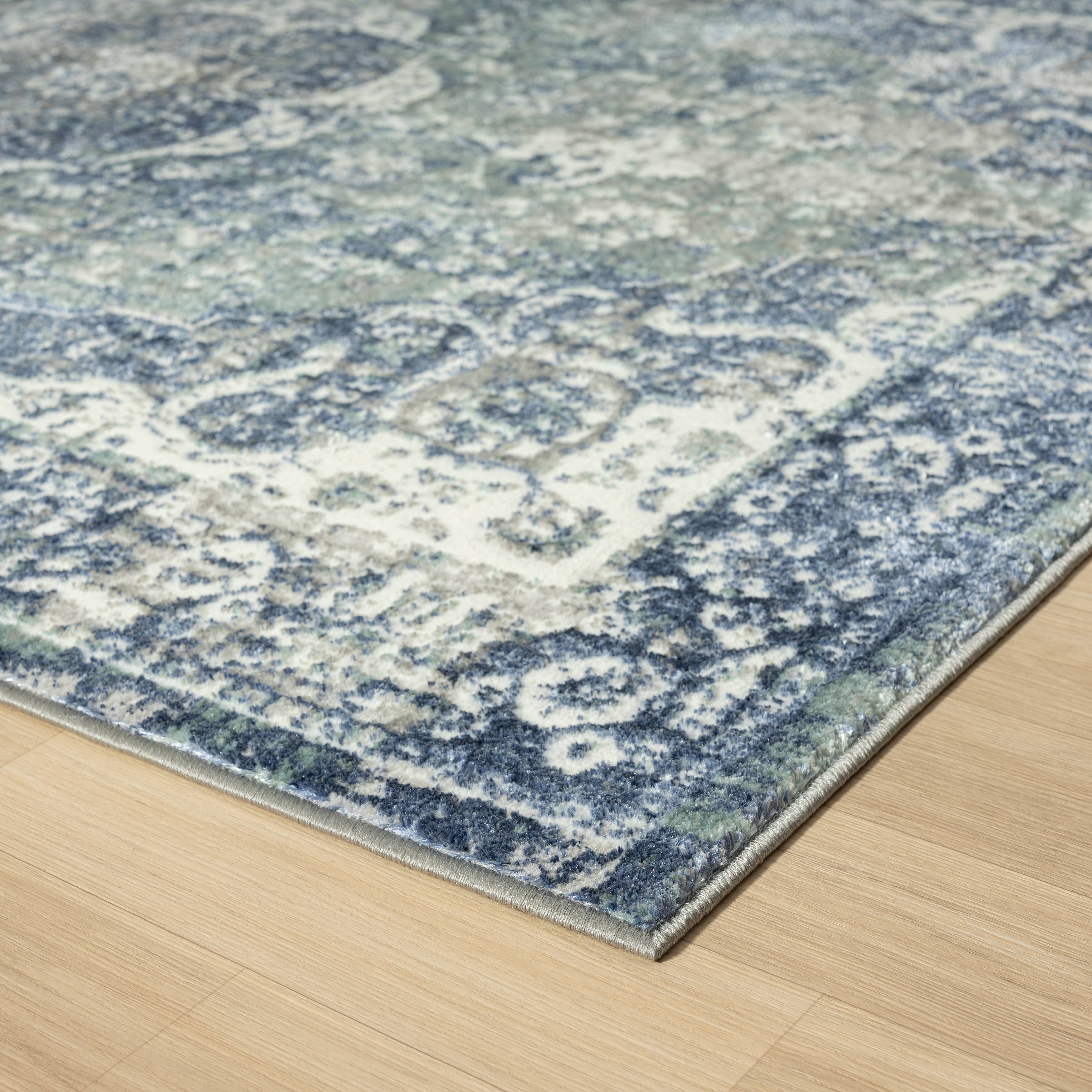 Angela Classic Traditional Blue Polyester Indoor Area Rug: 5' x 7'