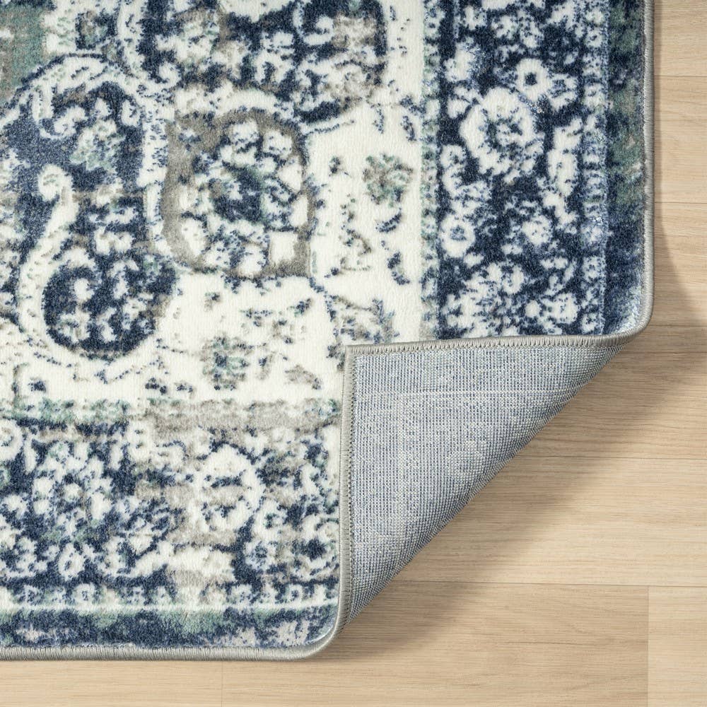 Angela Classic Traditional Blue Polyester Indoor Area Rug: 5' x 7'