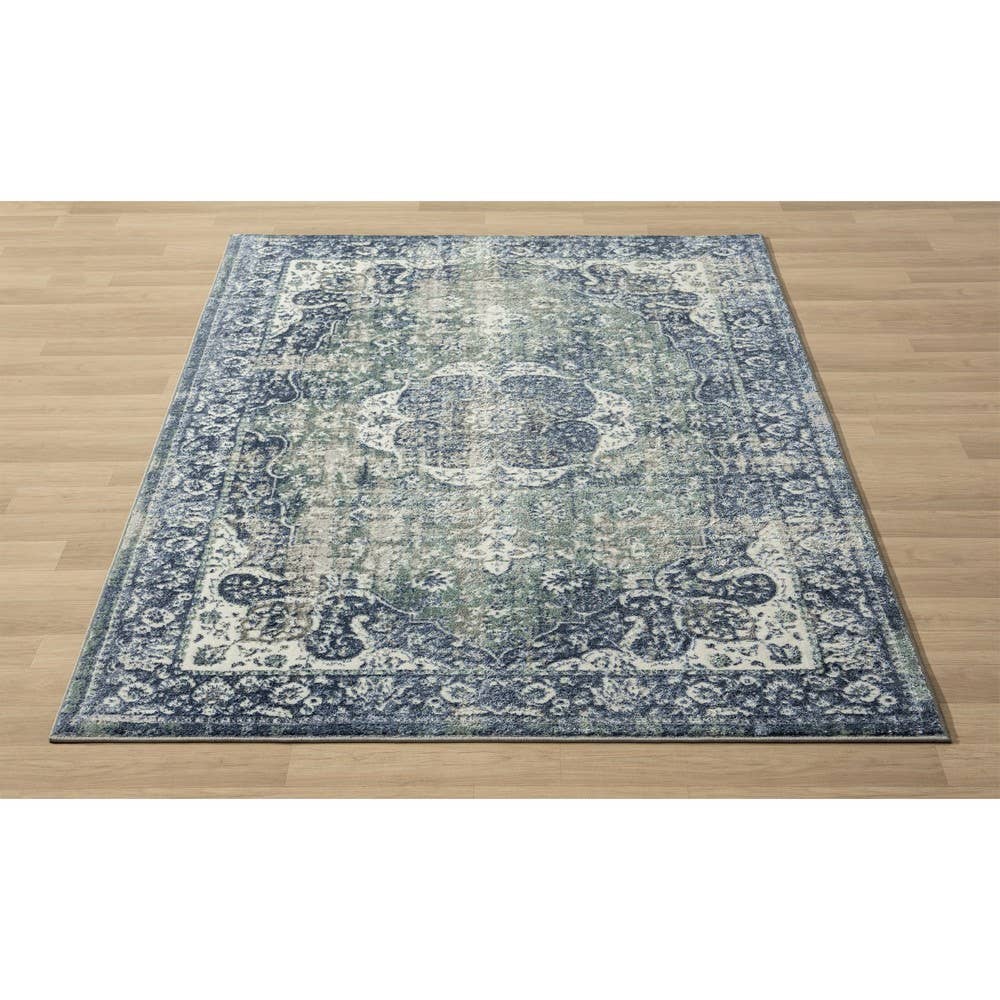 Angela Classic Traditional Blue Polyester Indoor Area Rug: 5' x 7'