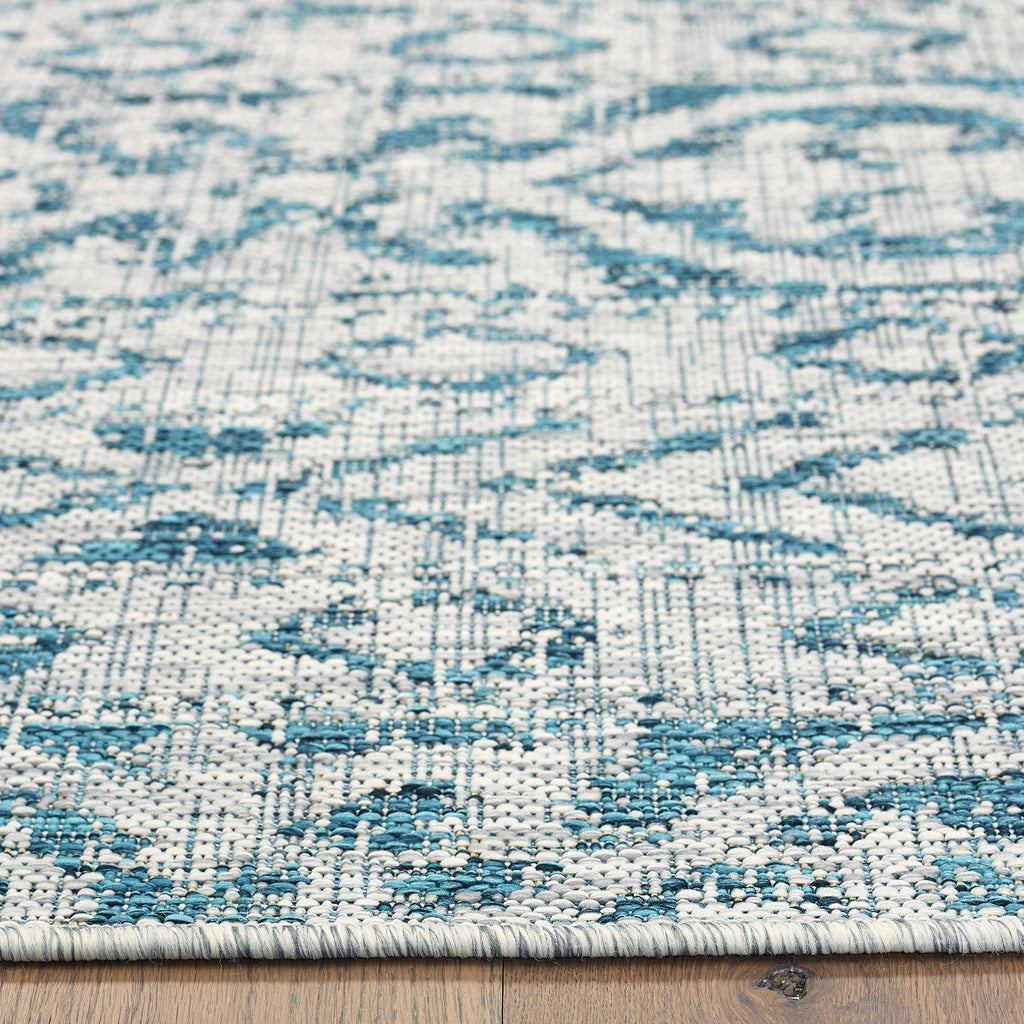 Sylvestra Geometric Blue/Green Indoor/Outdoor Area Rug: Ivory/Teal / 5' x 8'
