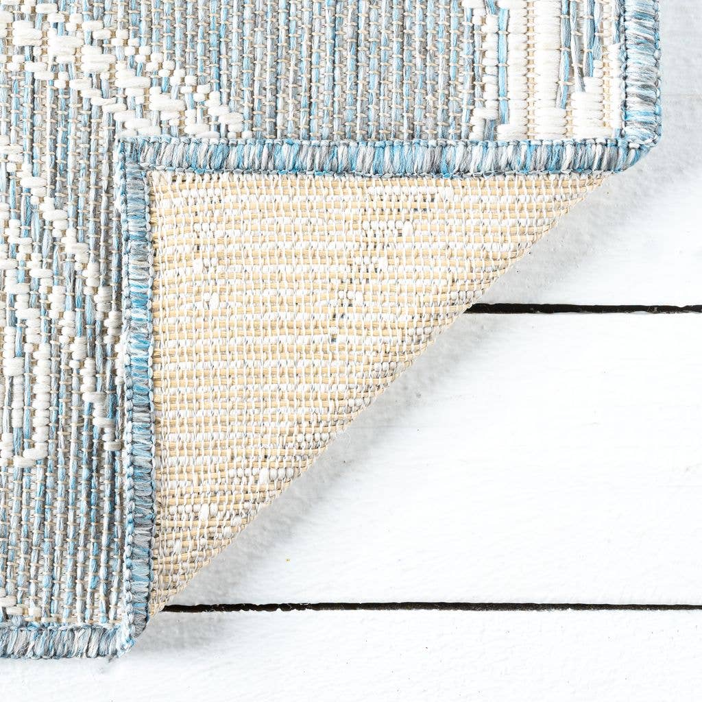 Ocean Blue Tropical Flower Indoor/Outdoor Area Rug: 5'3" x 7'6"