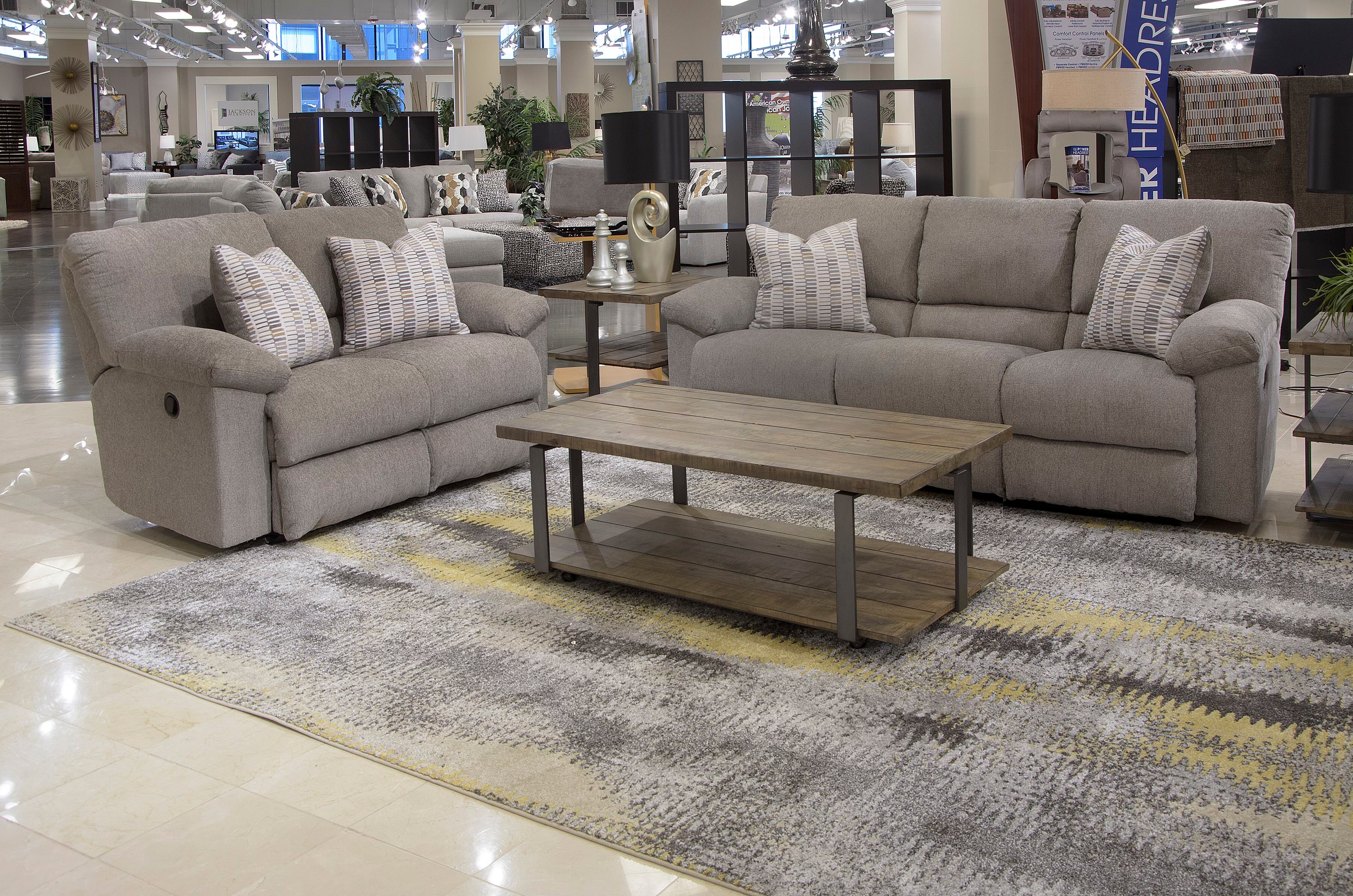 Stonewash Brown Reclining Sofa and Loveseat